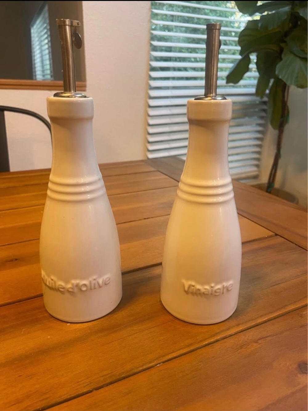 Le Creuset Embossed Ceramic Oil & Vinegar Bottles in Cream